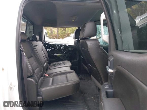 2016 GMC Sierra 2500HD Denali z VIN 1GT12UE82GF130096, wystawiony jako IAAI lot #41869448 z przebiegiem 129 659 mil mil oraz . Historia ofert i sprzedaży dostępna na DreamBid. Obrazek 8.