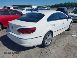 2013 Volkswagen CC Sport z VIN WVWAP7AN7DE545141, wystawiony jako IAAI lot #42325238 z przebiegiem 170 478 mil mil oraz . Historia ofert i sprzedaży dostępna na DreamBid. Obrazek 4.
