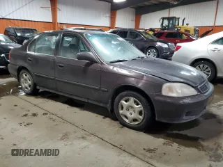 2000 Honda Civic z VIN 2HGEJ6688YH914377, wystawiony jako Copart lot #82462364 z przebiegiem 275 051 mil mil oraz Czysty tytuł • Clean title. Historia ofert i sprzedaży dostępna na DreamBid. Obrazek 4.