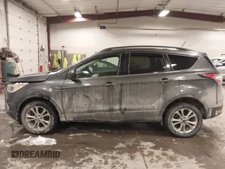 2018 Ford Escape SE with VIN 1FMCU9GD8JUA53114, listed as a IAAI auction lot 41592808 with 167,659 mi miles. Bid and sale history available at carsss.com. Image 14.