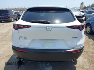 2021 Mazda CX-30 Select with VIN 3MVDMBBL9MM313039, listed as a IAAI auction lot 42575424 with 21,083 mi miles and . Bid and sale history available at DreamBid. Image 16.
