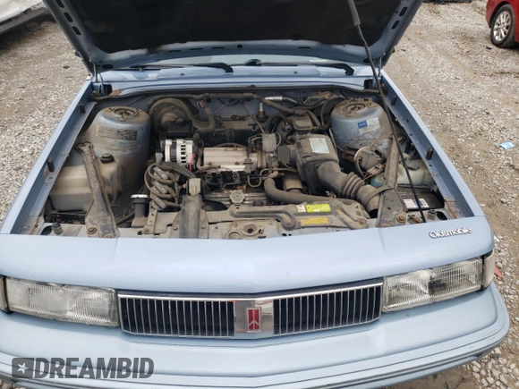 1993 Oldsmobile Cutlass Ciera S z VIN 1G3AG55N9P6451968, wystawiony jako Copart lot #72746634 z przebiegiem 88 151 mil mil oraz Szkoda całkowita • Salvage title. Historia ofert i sprzedaży dostępna na DreamBid. Obrazek 11.