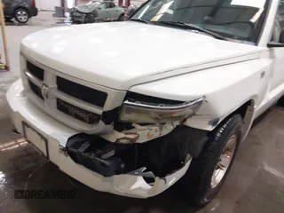 2009 Dodge Dakota Bighorn/Lonestar with VIN 1D3HW32P79S819674, listed as a IAAI auction lot 41962369 with 157,399 mi miles and . Bid and sale history available at carsss.com. Image 6.
