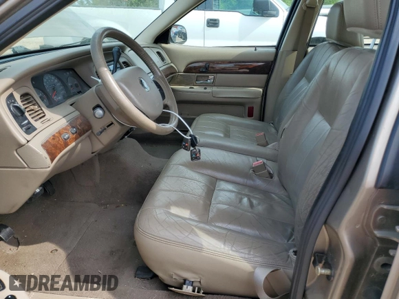2005 Mercury Grand Marquis LS Premium z VIN 2MEFM75W65X609038, wystawiony jako Copart lot #55766005 z przebiegiem 132 136 mil mil oraz Szkoda całkowita • Salvage title. Historia ofert i sprzedaży dostępna na DreamBid. Obrazek 7.