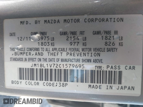 2012 Mazda Mazda3 i Touring with VIN JM1BL1V72C1579695, listed as a IAAI auction lot 41581364 with 126,535 mi miles. Bid and sale history available at carsss.com. Image 9.