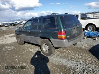 1996 Jeep Grand Cherokee Laredo with VIN 1J4GZ58S0TC245935, listed as a Copart auction lot 44782555 with 268,742 mi miles and Salvage Title. Bid and sale history available at carsss.com. Image 2.