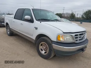 2002 Ford F-150 XLT with VIN 1FTRW07672KB51442, listed as a IAAI auction lot 41375961 with 237,564 mi miles. Bid and sale history available at carsss.com. Image 1.