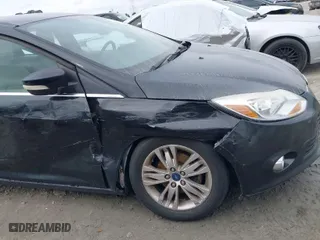 2012 Ford Focus SEL with VIN 1FAHP3M2XCL363037, listed as a IAAI auction lot 41816361 with 101,693 mi miles. Bid and sale history available at carsss.com. Image 6.