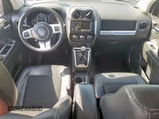 2015 Jeep Compass High Altitude Edition with VIN 1C4NJDEB2FD408957, listed as a Copart auction lot 52639735 with 129,767 mi miles and Salvage Title. Bid and sale history available at carsss.com. Image 8.