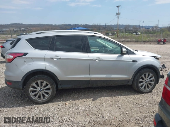 2017 Ford Escape Titanium with VIN 1FMCU9JD0HUE42509, listed as a IAAI auction lot 42079984 with 1 mi miles. Bid and sale history available at carsss.com. Image 14.