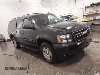 2007 Chevrolet Suburban LTZ with VIN 1GNFK16367R231896, listed as a IAAI auction lot 41979944 with 202,137 mi miles. Bid and sale history available at carsss.com. Image 1.