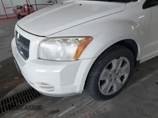 2007 Dodge Caliber SXT with VIN 1B3HB48B47D540482, listed as a IAAI auction lot 41942169 with 194,573 mi miles and . Bid and sale history available at DreamBid. Image 6.