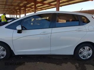 2020 Honda Fit LX z VIN 3HGGK5H45LM717560, wystawiony jako IAAI lot #41679343 z przebiegiem 47 134 mil mil oraz . Historia ofert i sprzedaży dostępna na DreamBid. Obrazek 14.