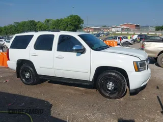 2007 Chevrolet Tahoe LTZ with VIN 1GNFK13057J121978, listed as a IAAI auction lot 42643202 with 240,004 mi miles and . Bid and sale history available at DreamBid. Image 13.
