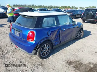 2019 MINI Hardtop Cooper with VIN WMWXP5C52K2H97728, listed as a IAAI auction lot 42026666 with 61,464 mi miles and . Bid and sale history available at DreamBid. Image 4.
