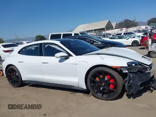 2023 Porsche Taycan GTS z VIN WP0CD2Y14PSA90216, wystawiony jako IAAI lot #42397991 z przebiegiem 1 868 mil mil oraz . Historia ofert i sprzedaży dostępna na DreamBid. Obrazek 13.