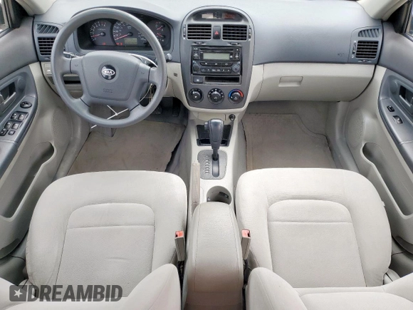 2006 Kia Spectra EX z VIN KNAFE121665281639, wystawiony jako Copart lot #54583825 z przebiegiem 121 167 mil mil oraz Szkoda całkowita • Salvage title. Historia ofert i sprzedaży dostępna na DreamBid. Obrazek 8.