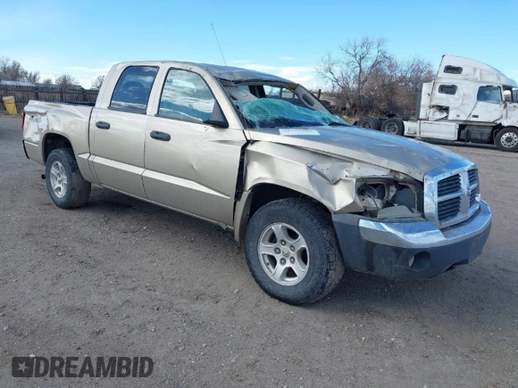 2005 Dodge Dakota SLT with VIN 1D7HW48N45S199371, listed as a IAAI auction lot 41792900 with 170,893 mi miles. Bid and sale history available at carsss.com. Image 1.