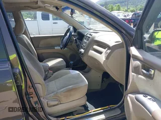 2005 Kia Sportage LX with VIN KNDJE723957075445, listed as a IAAI auction lot 42573760 with 185,000 mi miles and . Bid and sale history available at DreamBid. Image 5.