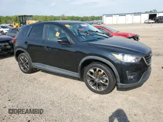 2016 Mazda CX-5 Grand Touring with VIN JM3KE2DY4G0761993, listed as a Copart auction lot 53204265 with 184,249 mi miles and Clean Title. Bid and sale history available at carsss.com. Image 4.