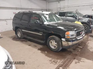 2003 GMC Yukon SLT with VIN 1GKEK13ZX3R184688, listed as a IAAI auction lot 41039900 with 326,233 mi miles. Bid and sale history available at carsss.com. Image 1.