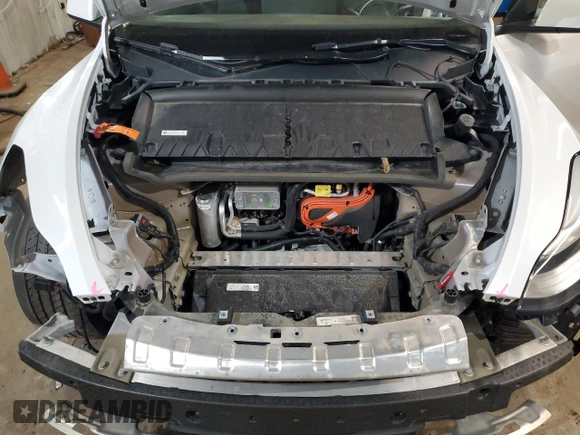2023 Tesla Model Y Long Range z VIN 7SAYGDEE5PF619265, wystawiony jako Copart lot #48418655 z przebiegiem 42 233 mil mil oraz Szkoda całkowita • Salvage title. Historia ofert i sprzedaży dostępna na DreamBid. Obrazek 13.