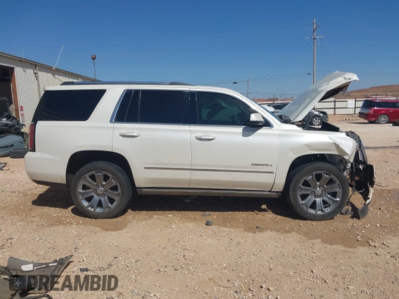 2015 GMC Yukon Denali with VIN 1GKS2CKJ3FR568729, listed as a IAAI auction lot 41741987 with 154,729 mi miles. Bid and sale history available at carsss.com. Image 13.