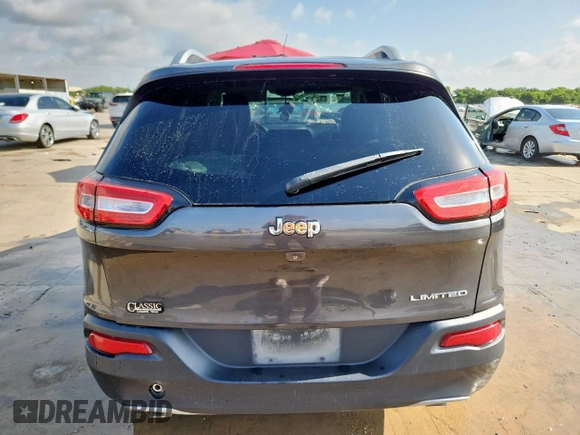 2014 Jeep Cherokee Limited with VIN 1C4PJLDS0EW238119, listed as a Copart auction lot 61607495 with 181,689 mi miles and Salvage title. Bid and sale history available at DreamBid. Image 6.