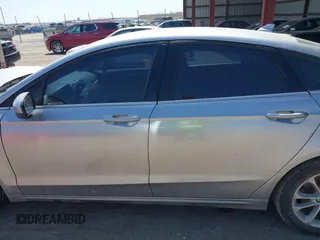 2020 Ford Fusion SE z VIN 3FA6P0HD9LR231471, wystawiony jako IAAI lot #41986473 z przebiegiem 58 587 mil mil oraz . Historia ofert i sprzedaży dostępna na DreamBid. Obrazek 15.
