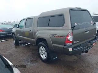 2014 Toyota Tacoma with VIN 5TFLU4EN6EX104410, listed as a IAAI auction lot 41925708 with 189,375 mi miles. Bid and sale history available at carsss.com. Image 3.