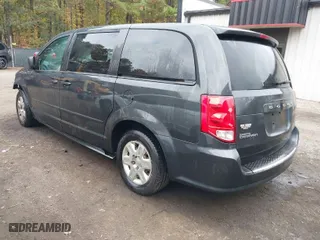 2011 Dodge Grand Caravan Express with VIN 2D4RN4DG2BR731905, listed as a IAAI auction lot 40701611 with 128,699 mi miles. Bid and sale history available at carsss.com. Image 3.