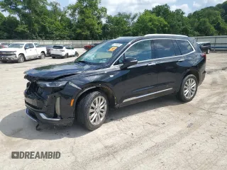 2021 Cadillac XT6 Premium Luxury z VIN 1GYKPDRS4MZ223007, wystawiony jako Copart lot #63768525 z przebiegiem 42 938 mil mil oraz Szkoda całkowita • Salvage title. Historia ofert i sprzedaży dostępna na DreamBid. Obrazek 1.
