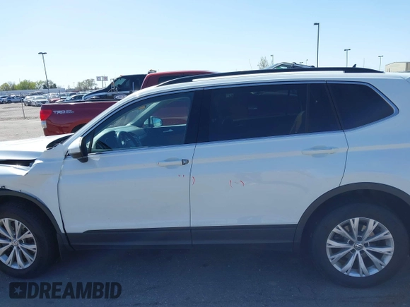 2019 Volkswagen Tiguan SE with VIN 3VV2B7AX8KM193166, listed as a IAAI auction lot 41957720 with 61,981 mi miles and . Bid and sale history available at DreamBid. Image 14.