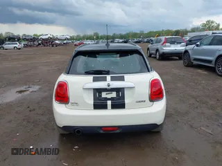2015 MINI Hardtop 4 Door with VIN WMWXS5C52FT831291, listed as a IAAI auction lot 42179801 with 63,261 mi miles and . Bid and sale history available at DreamBid. Image 17.