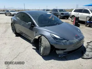 2022 Tesla Model 3 Long Range z VIN 5YJ3E1EBXNF263832, wystawiony jako Copart lot #57177445 z przebiegiem Nie podano mil oraz Szkoda całkowita • Salvage title. Historia ofert i sprzedaży dostępna na DreamBid. Obrazek 13.