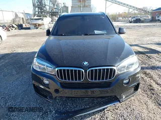 2017 BMW X5 sDrive35i with VIN 5UXKR2C3XH0X06113, listed as a IAAI auction lot 41951474 with 139,420 mi miles. Bid and sale history available at carsss.com. Image 12.