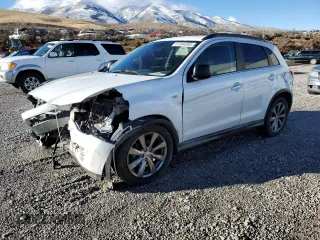 2013 Mitsubishi Outlander Sport LE with VIN 4A4AP5AU0DE019163, listed as a Copart auction lot 87094204 with 136,214 mi miles and Salvage Title. Bid and sale history available at carsss.com. Image 1.