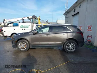 2020 Cadillac XT5 Premium Luxury FWD with VIN 1GYKNCRS0LZ122920, listed as a IAAI auction lot 41021418 with 68,125 mi miles. Bid and sale history available at carsss.com. Image 14.