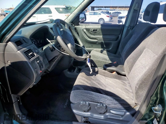 1999 Honda CR-V LX with VIN JHLRD174XXC045114, listed as a Copart auction lot 53889575 with 192,879 mi miles and Salvage Title. Bid and sale history available at carsss.com. Image 7.