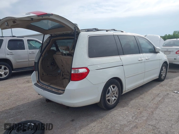 2007 Honda Odyssey EX-L with VIN 5FNRL38787B051582, listed as a IAAI auction lot 42104718 with 193,630 mi miles and . Bid and sale history available at DreamBid. Image 4.