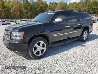 2013 Chevrolet Suburban LTZ with VIN 1GNSCKE0XDR364889, listed as a Copart auction lot 77598334 with 161,656 mi miles and Salvage Title. Bid and sale history available at carsss.com. Image 1.