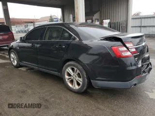 2015 Ford Taurus SEL with VIN 1FAHP2E94FG137935, listed as a Copart auction lot 80921824 with 172,324 mi miles and Salvage Title. Bid and sale history available at DreamBid. Image 2.