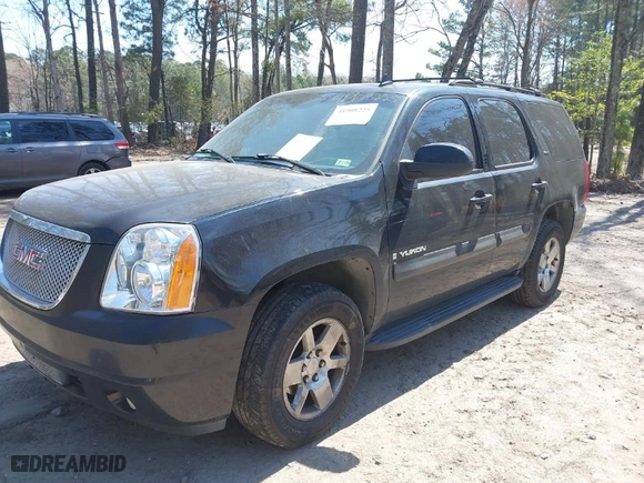 2007 GMC Yukon SLT with VIN 1GKFC13017R255432, listed as a IAAI auction lot 41908225 with 243,059 mi miles. Bid and sale history available at carsss.com. Image 2.