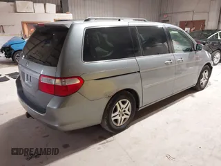 2006 Honda Odyssey EX with VIN 5FNRL38486B090693, listed as a IAAI auction lot 41865491 with 198,104 mi miles. Bid and sale history available at carsss.com. Image 4.