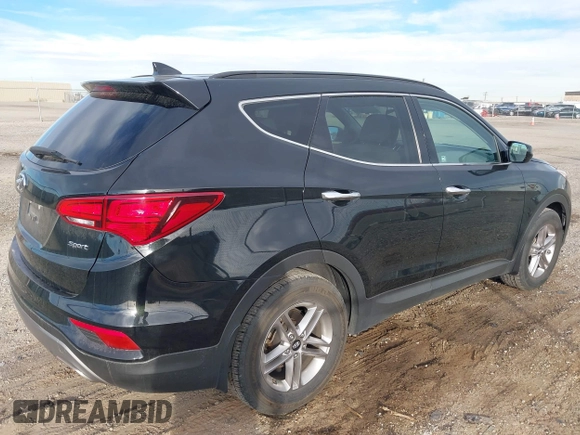 2017 Hyundai Santa Fe 2.4L z VIN 5XYZU3LB5HG425830, wystawiony jako IAAI lot #41428863 z przebiegiem 76 366 mil mil oraz . Historia ofert i sprzedaży dostępna na DreamBid. Obrazek 4.