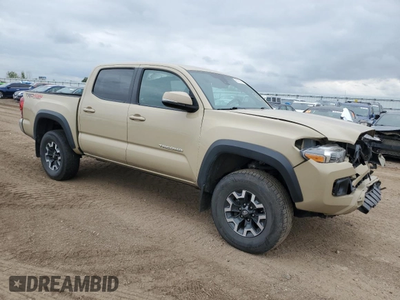 2018 Toyota Tacoma SR with VIN 3TMCZ5AN8JM145862, listed as a Copart auction lot 60190215 with 81,909 mi miles and Salvage title. Bid and sale history available at DreamBid. Image 4.