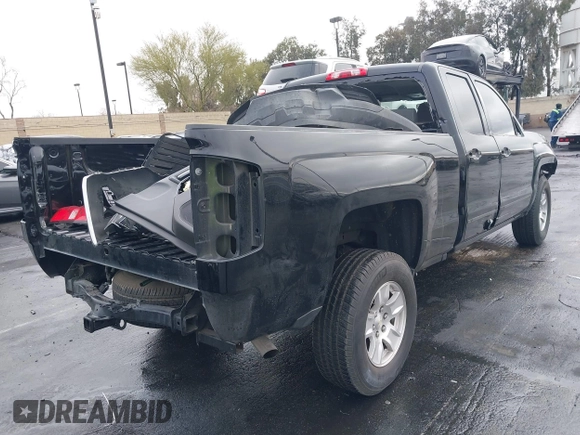 2017 Chevrolet Silverado 1500 LT with VIN 1GCRCREC5HZ113150, listed as a IAAI auction lot 41826582 with 50,565 mi miles and . Bid and sale history available at DreamBid. Image 4.