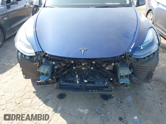 2022 Tesla Model Y Performance with VIN 7SAYGDEF7NF497076, listed as a IAAI auction lot 41759793 with 46,970 mi miles and . Bid and sale history available at DreamBid. Image 6.