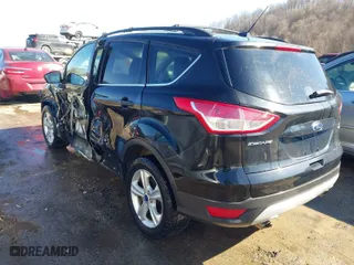 2013 Ford Escape SE with VIN 1FMCU9GX4DUD30453, listed as a IAAI auction lot 41589446 with 130,556 mi miles. Bid and sale history available at carsss.com. Image 3.
