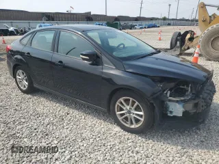 2016 Ford Focus SE with VIN 1FADP3F22GL233402, listed as a Copart auction lot 60854175 with 77,002 mi miles and Salvage title. Bid and sale history available at DreamBid. Image 4.